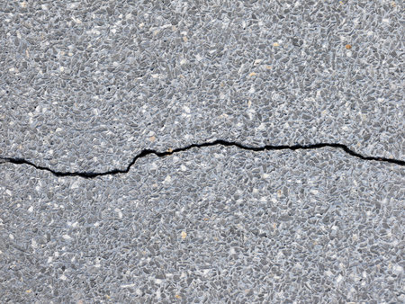 Cracks on gray stone textureの写真素材
