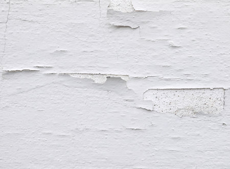 Cracked concrete wall backgroundの写真素材