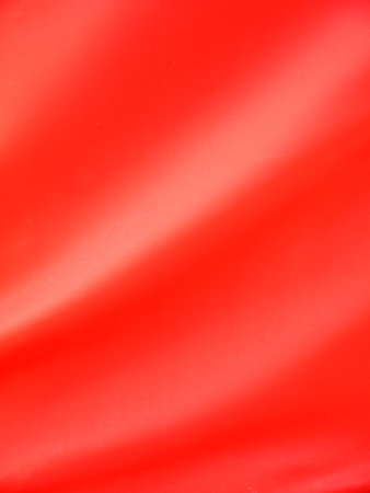 red satin or silk fabric cloth as background texture