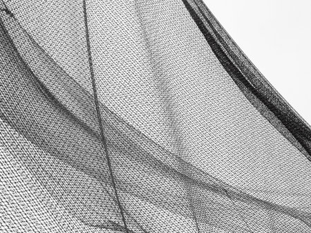 fishing net against a white backgroundの写真素材