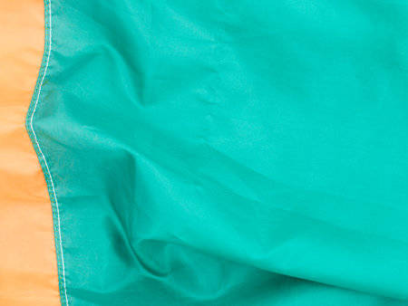 Green and orange canvas texture backgroundの写真素材