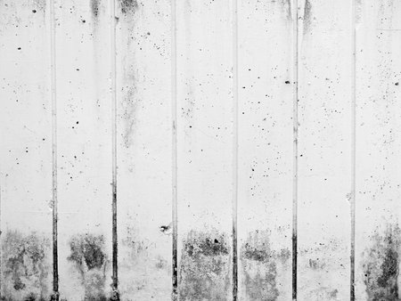 dirty white concrete wall backgroundの写真素材