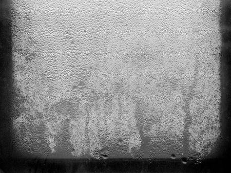 Texture drops of water on the transparent glassの写真素材