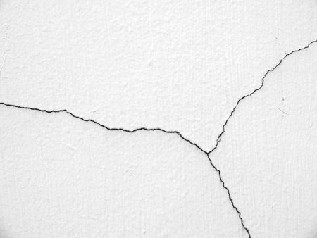 white wall with cracksの写真素材