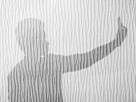 white paper with man shadowの写真素材