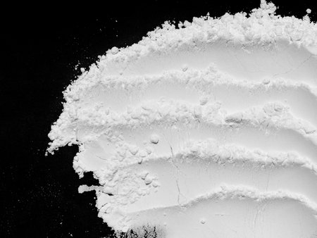 flour on black background