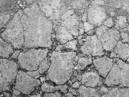 Cracked concrete texture closeup backgroundの写真素材