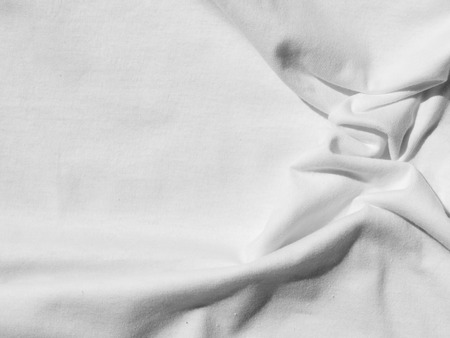 Crumpled white fabric cloth textureの写真素材