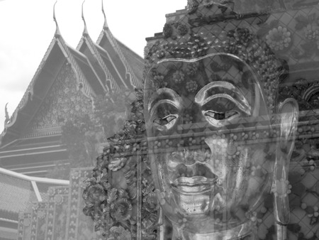 Face Buddha behind glassの写真素材