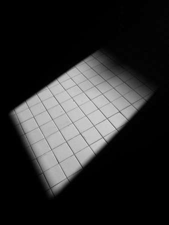 tile floor with shadowの写真素材