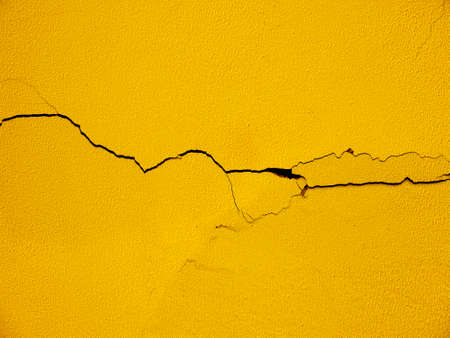 yellow wall with crack texture