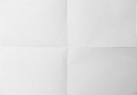 White sheet of paper folded textureの写真素材