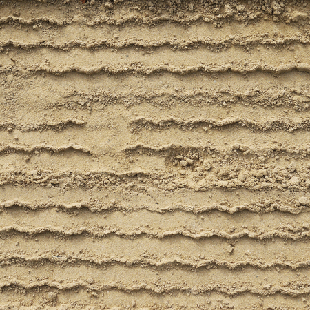 Wheel track on sandの写真素材