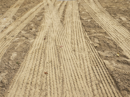 Wheel track on sandの写真素材