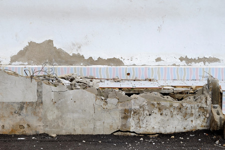 Damaged wall in a houseの写真素材