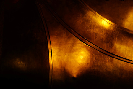 gold texture background on the back of buddha statue in templeの写真素材