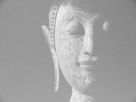 Shadow Face of Buddha on the wallの写真素材