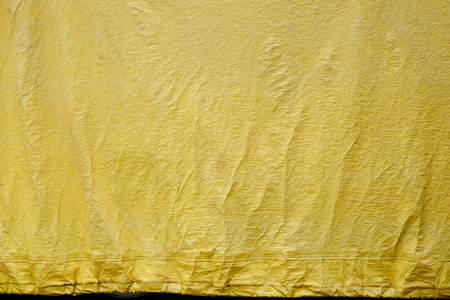 yellow fabric canvas backgroundの写真素材