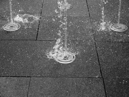 black and white fountain on floorの写真素材