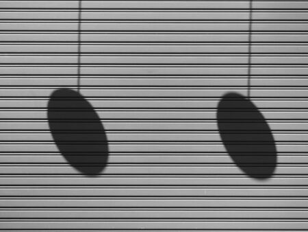 metallic roller shutter door with shadowの写真素材