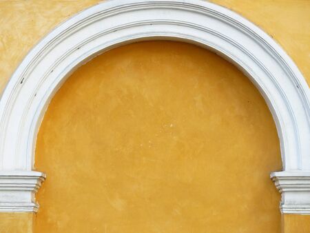 Old yellow wall textureの写真素材