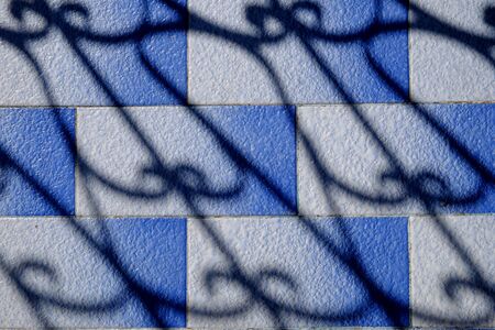 shadow on blue tile floor texture and patternの写真素材