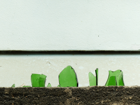 Broken glass on the wall