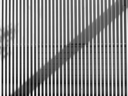black and white architecture metal wall design with light and shadowの写真素材