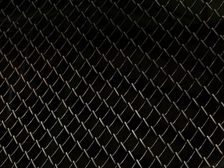 black and white cage with light and shadowの写真素材