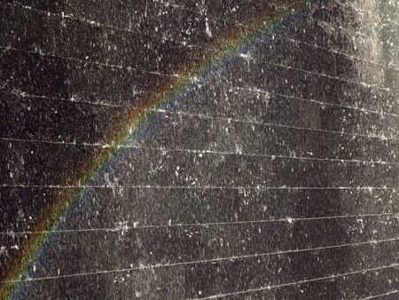 Waterfall wall with rainbowの写真素材