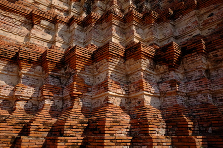 brick pagoda temple in thailandの写真素材
