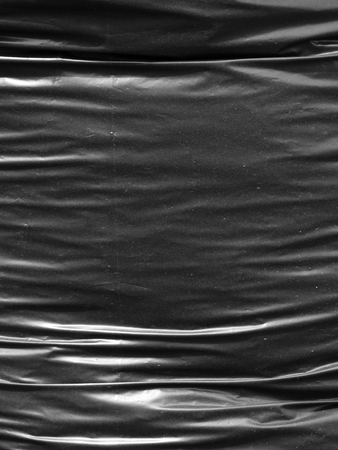 Texture of a black plastic bagの写真素材