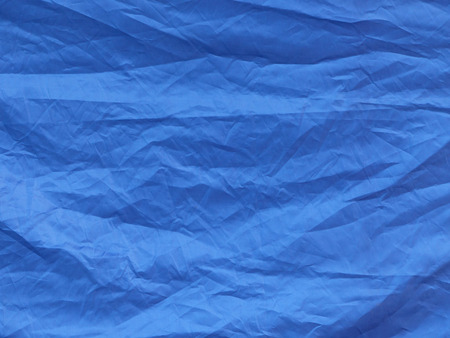 crumpled blue fabric cloth textureの写真素材