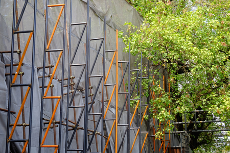 Working at the construction side that are steel tubes scaffolding