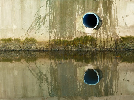 Drain water - allow to drain into the canalの写真素材