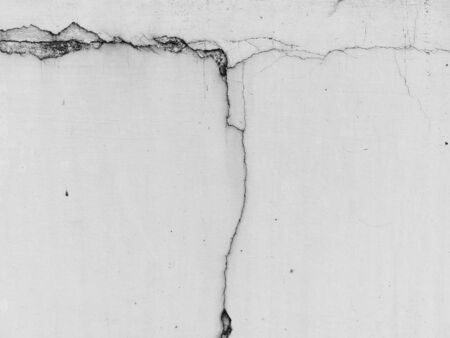 white wall with crack textureの写真素材