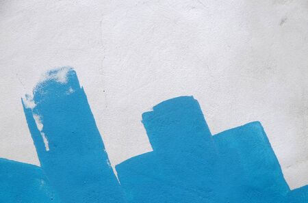 blue paint on white wall backgroundの写真素材