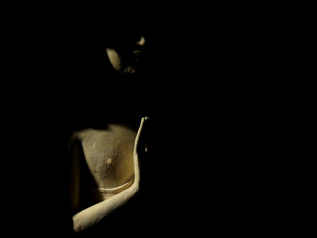 buddha statue with light and shadowの写真素材