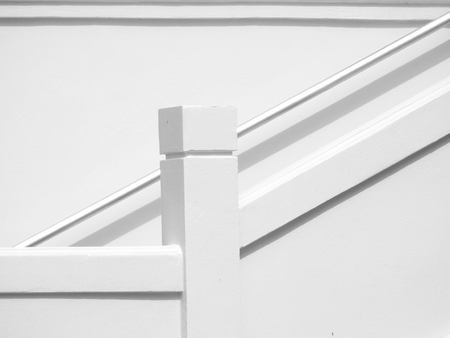 white wall with railの写真素材
