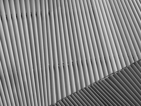 black and white aluminium architecture wall design pattern with light and shadowの写真素材