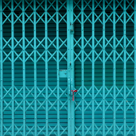 old blue green metal doorの写真素材