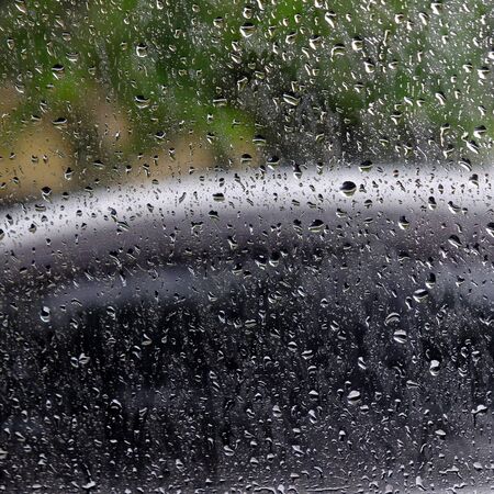 rain drop on glass window of car texture