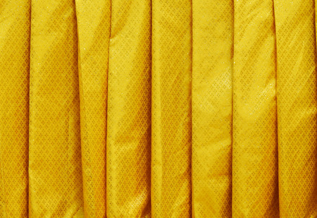gold fabric texture backgroundの写真素材