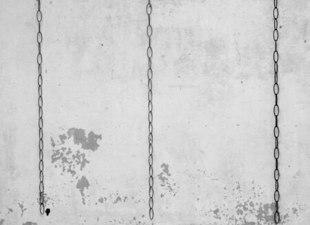 old white wall with chain