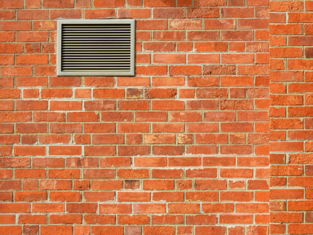 old brick wall with ventilatorの写真素材