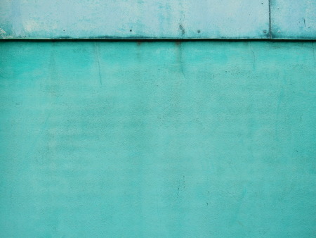 old green wall backgroundの写真素材