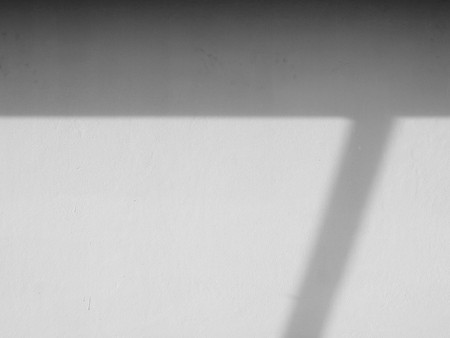 shadow on white wall black and white styleの写真素材