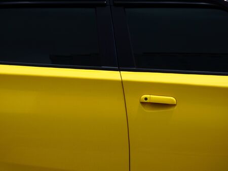door of yellow car textureの写真素材