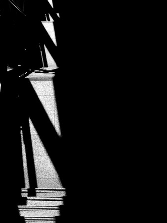 overpass stairs in the city with light and shadowの写真素材