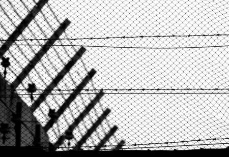 wire mesh fence of jailの写真素材
